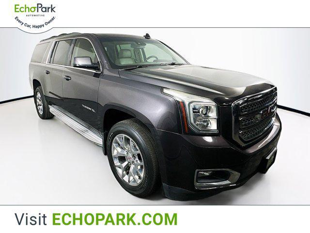 used 2015 GMC Yukon car, priced at $19,599