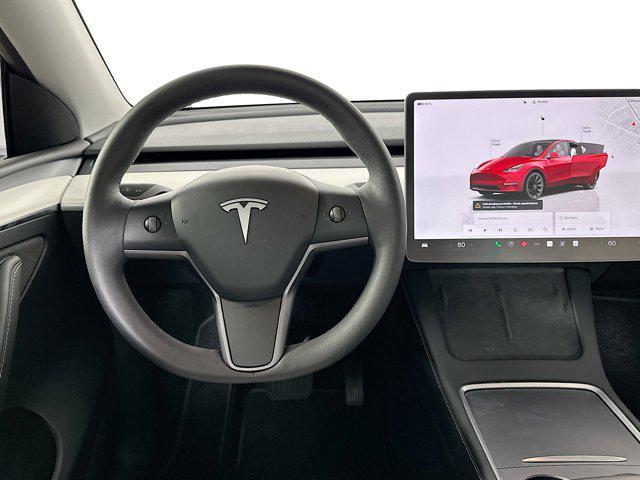 used 2023 Tesla Model Y car, priced at $32,497