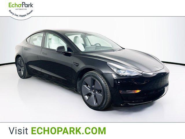used 2022 Tesla Model 3 car, priced at $27,597