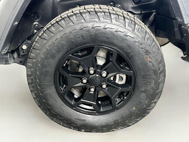 used 2023 Jeep Wrangler 4xe car, priced at $29,587