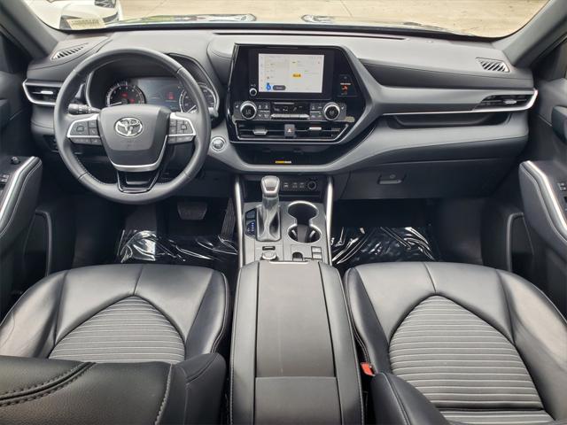 used 2023 Toyota Highlander car, priced at $38,488