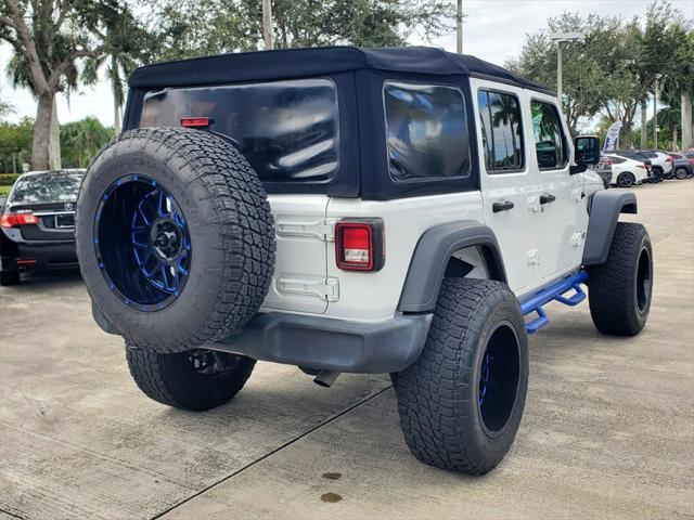 used 2018 Jeep Wrangler Unlimited car, priced at $27,188