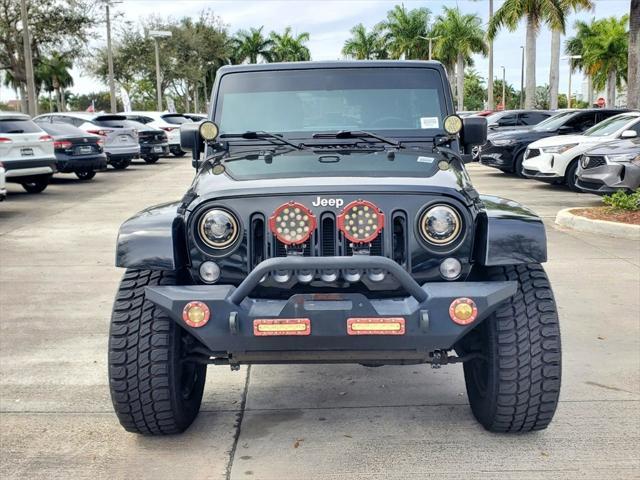 used 2015 Jeep Wrangler Unlimited car, priced at $21,588