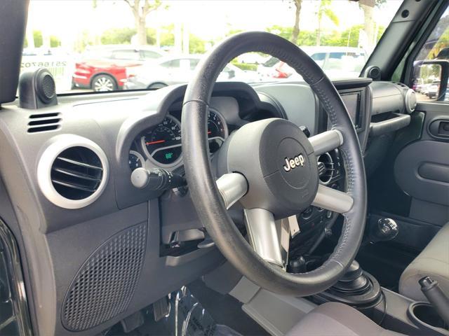 used 2010 Jeep Wrangler Unlimited car, priced at $11,088