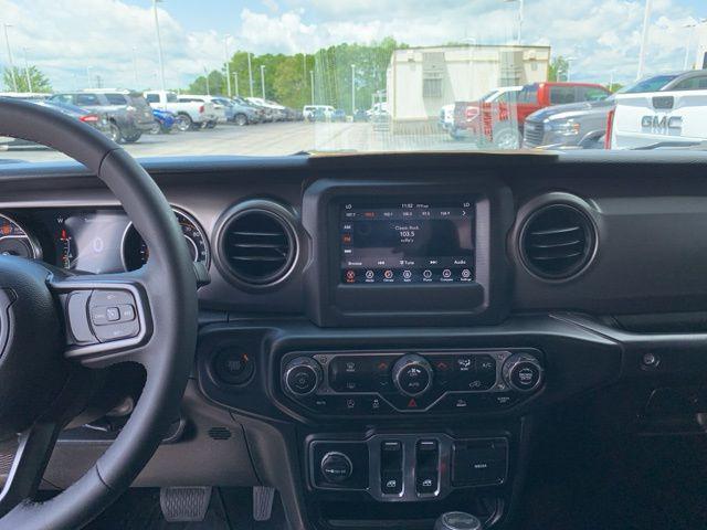 used 2023 Jeep Wrangler car, priced at $30,840