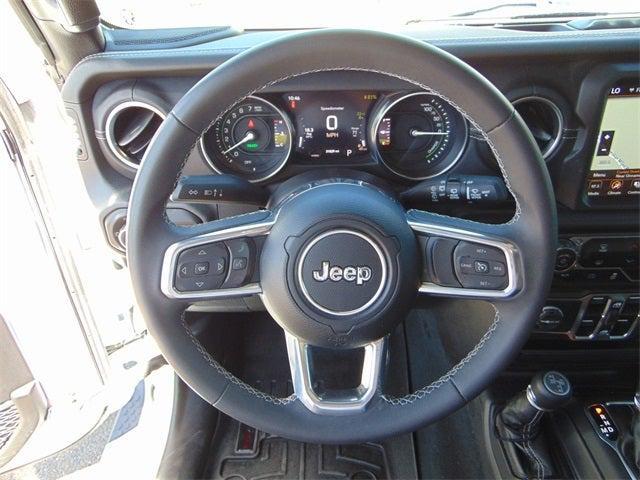 used 2023 Jeep Wrangler 4xe car, priced at $33,379