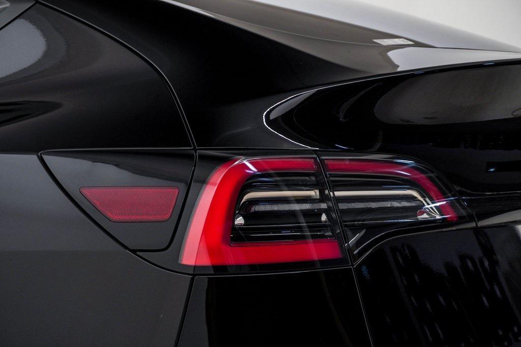 used 2021 Tesla Model Y car, priced at $26,500