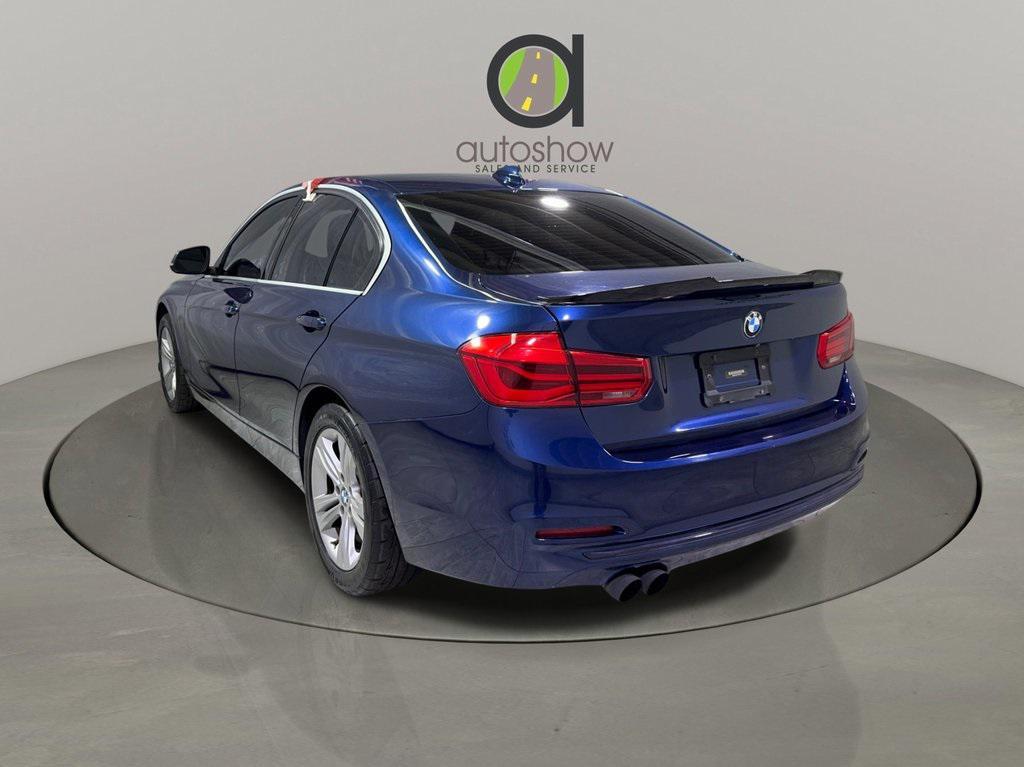 used 2018 BMW 330 car, priced at $14,644