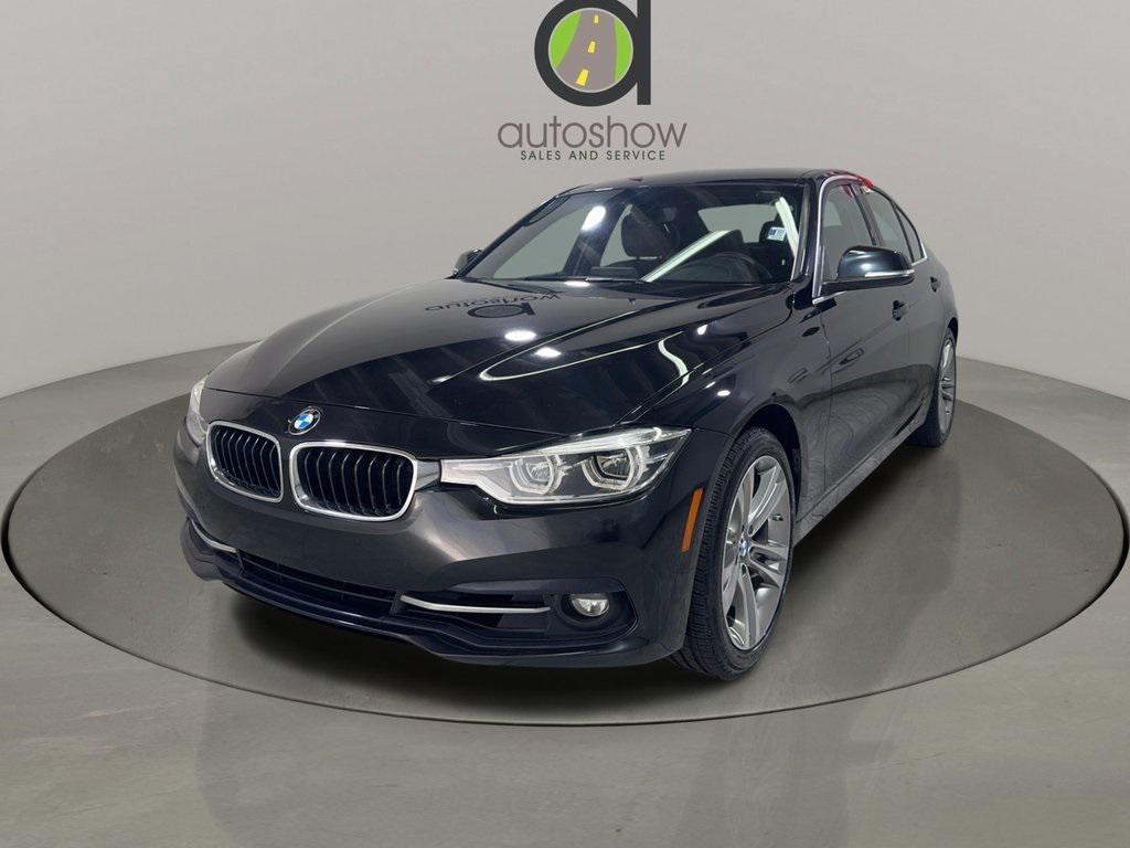 used 2018 BMW 330 car, priced at $13,990