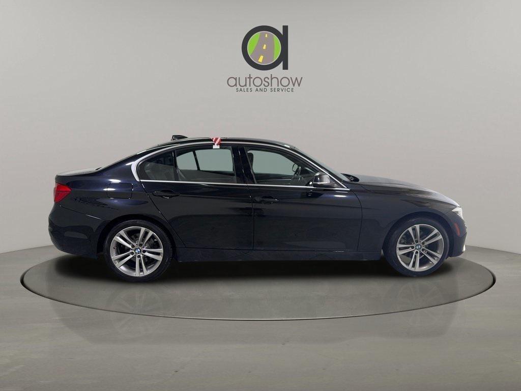 used 2018 BMW 330 car, priced at $13,990