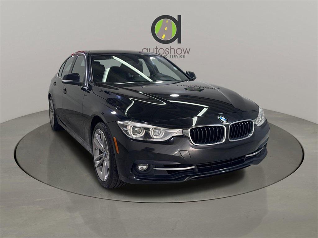 used 2018 BMW 330 car, priced at $13,990