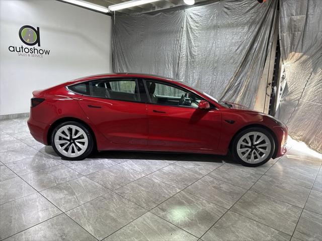 used 2022 Tesla Model 3 car, priced at $24,490