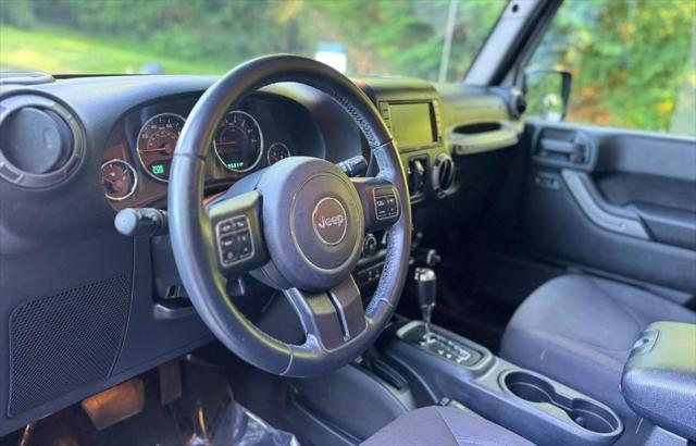 used 2018 Jeep Wrangler JK Unlimited car, priced at $19,500