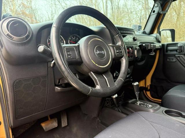 used 2013 Jeep Wrangler Unlimited car, priced at $19,500