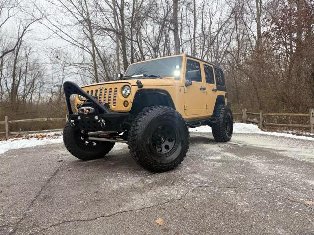 used 2013 Jeep Wrangler Unlimited car, priced at $19,500