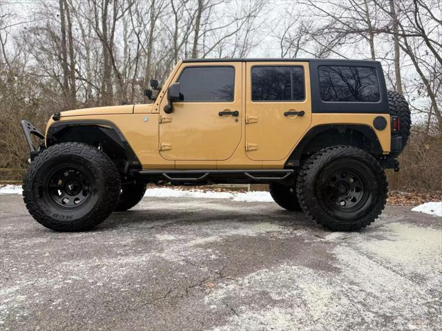 used 2013 Jeep Wrangler Unlimited car, priced at $19,500