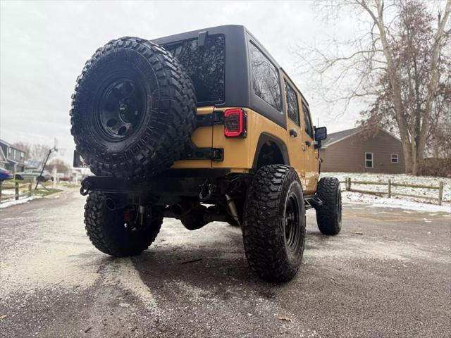 used 2013 Jeep Wrangler Unlimited car, priced at $19,500