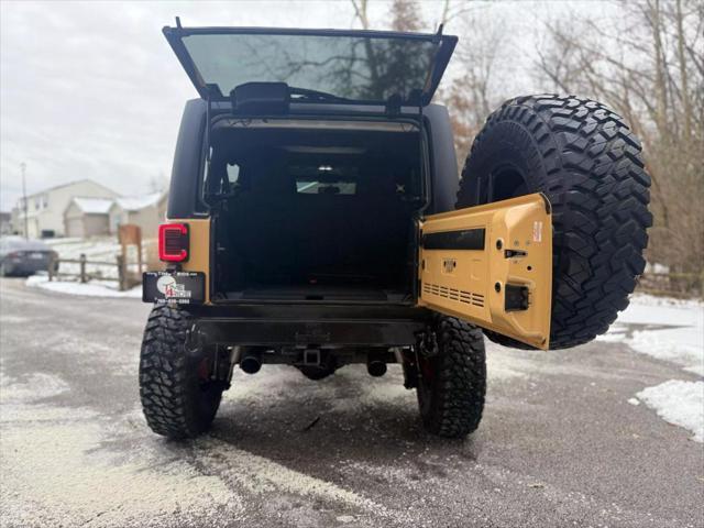 used 2013 Jeep Wrangler Unlimited car, priced at $19,500