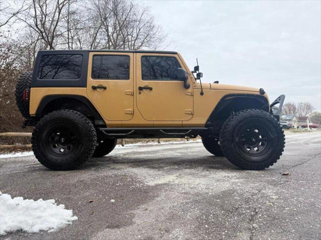 used 2013 Jeep Wrangler Unlimited car, priced at $19,500