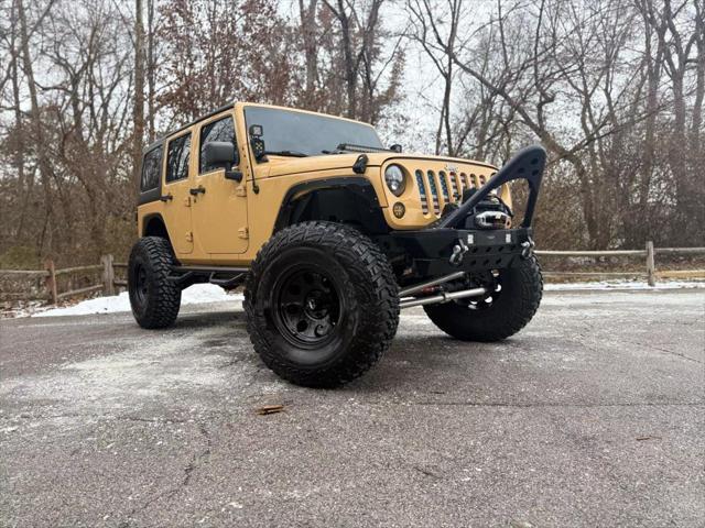 used 2013 Jeep Wrangler Unlimited car, priced at $19,500