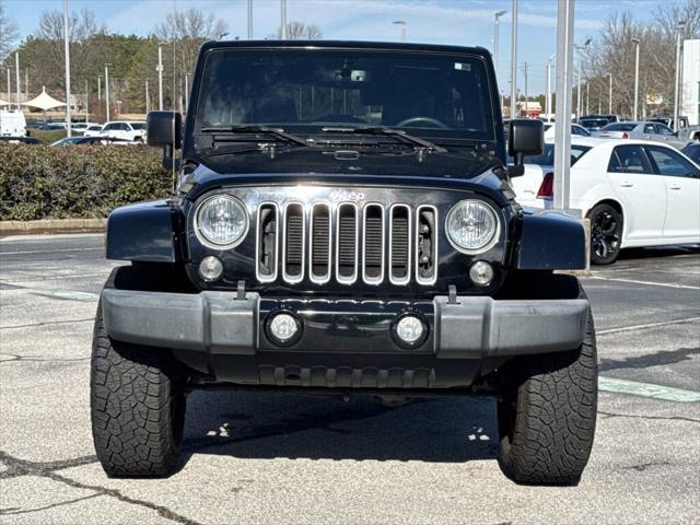 used 2016 Jeep Wrangler Unlimited car, priced at $21,877