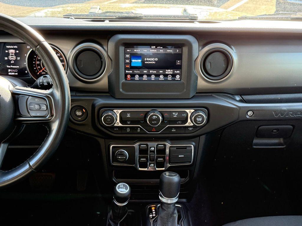 used 2021 Jeep Wrangler Unlimited car, priced at $25,517
