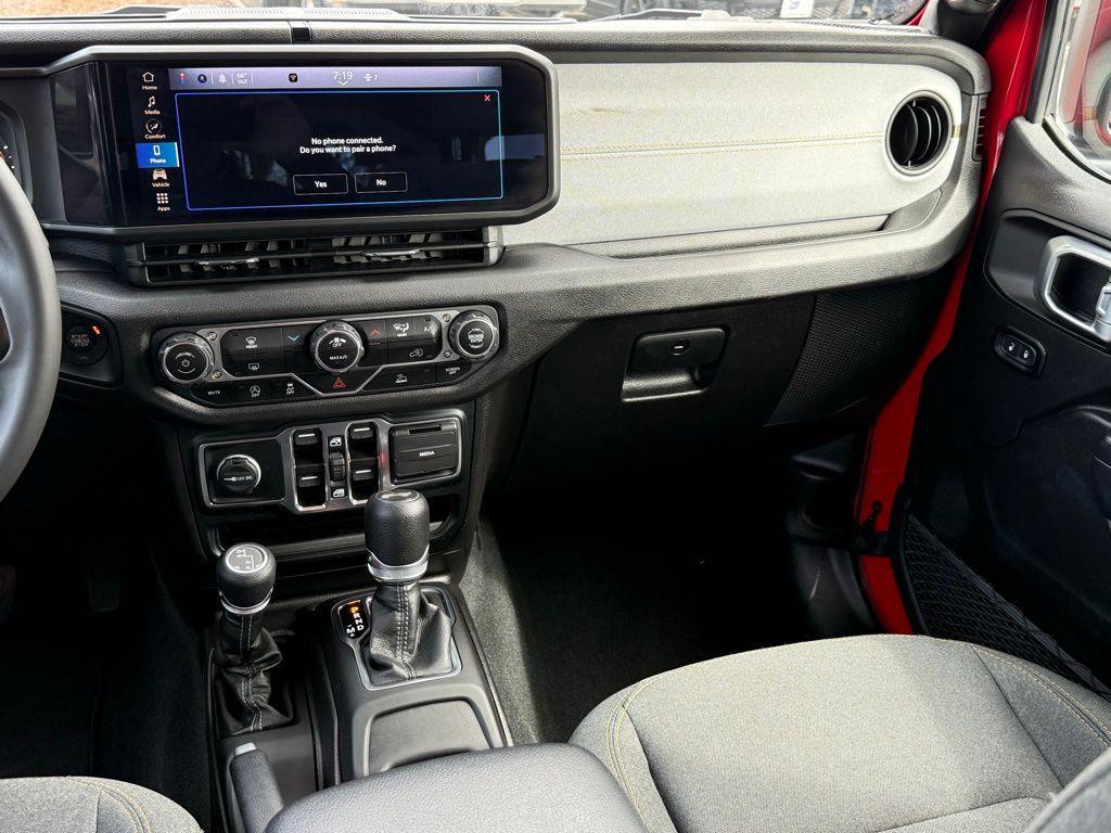 used 2024 Jeep Wrangler car, priced at $32,460