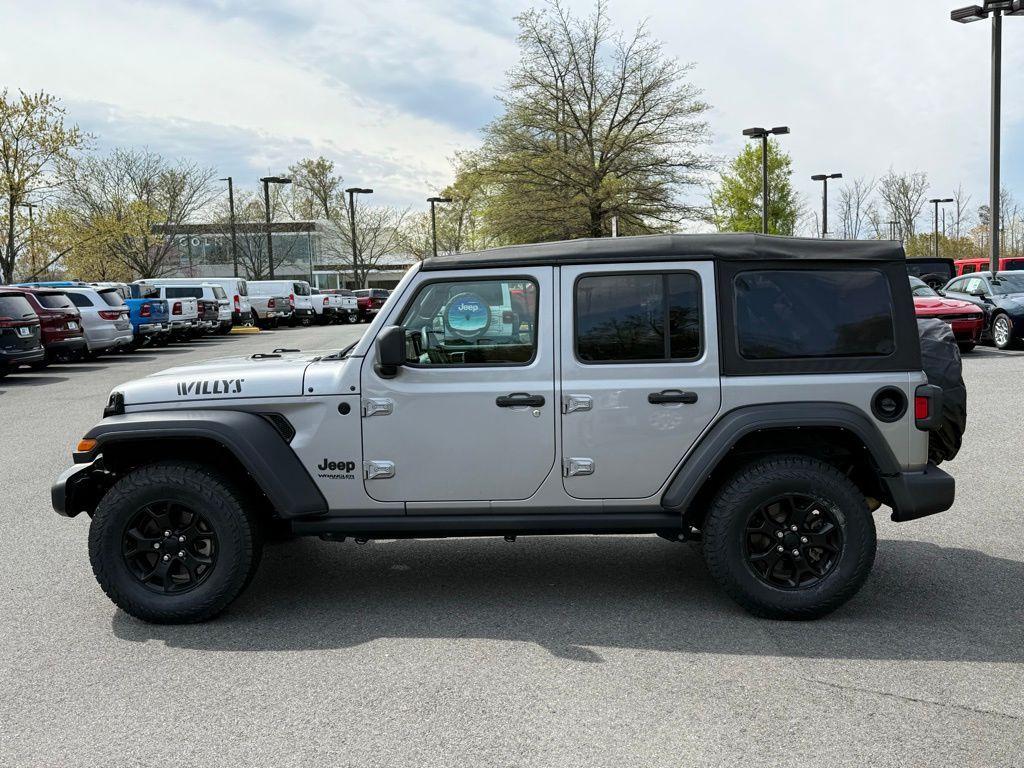 used 2021 Jeep Wrangler Unlimited car, priced at $29,936