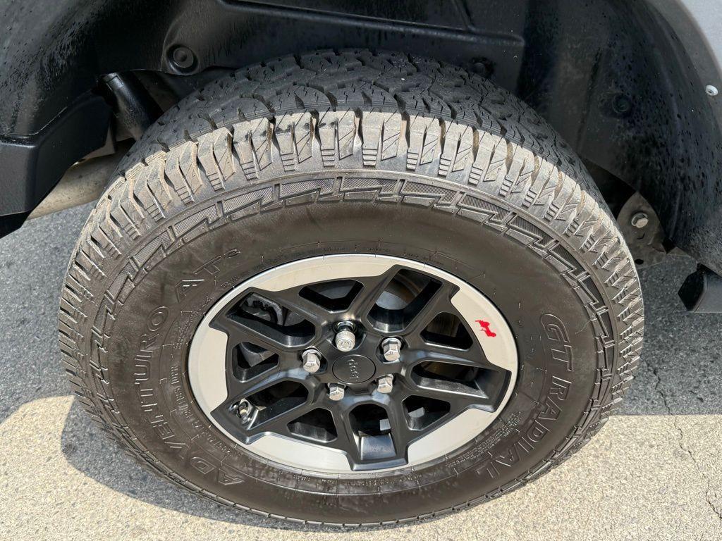 used 2021 Jeep Wrangler Unlimited car, priced at $33,425