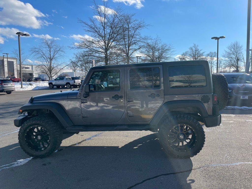 used 2018 Jeep Wrangler JK Unlimited car, priced at $19,176