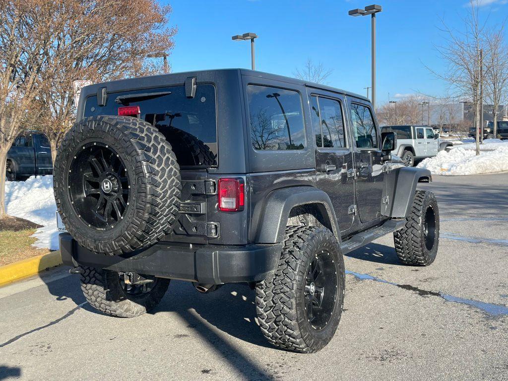 used 2018 Jeep Wrangler JK Unlimited car, priced at $19,176