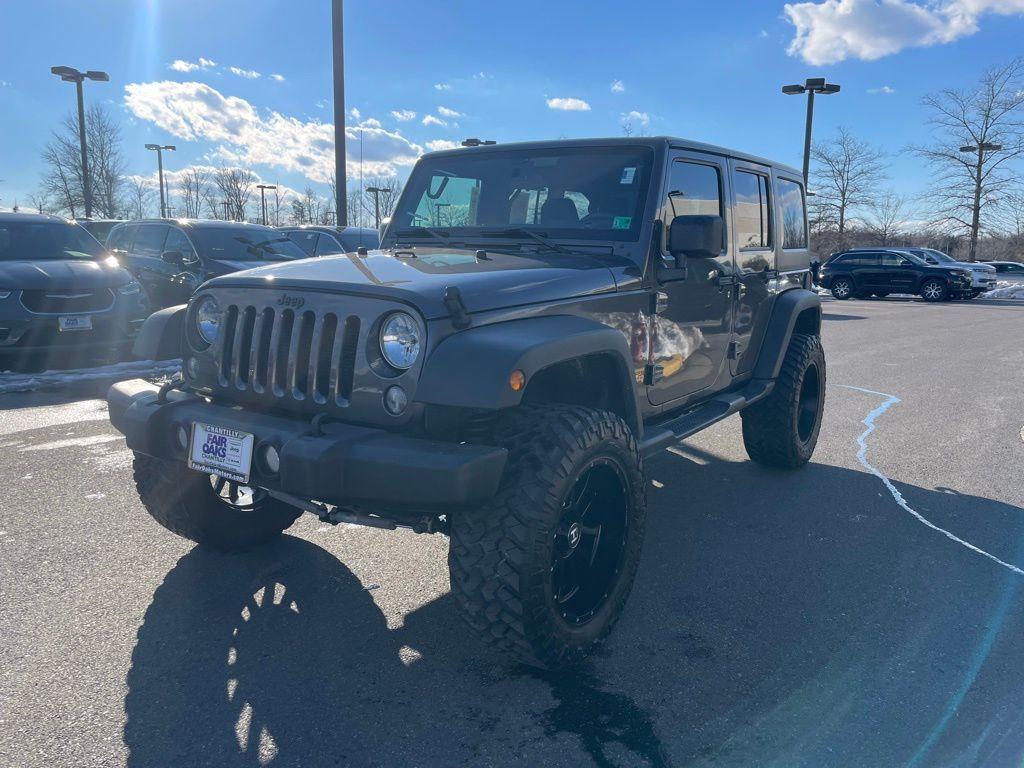 used 2018 Jeep Wrangler JK Unlimited car, priced at $19,176