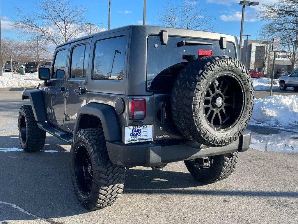 used 2018 Jeep Wrangler JK Unlimited car, priced at $19,176