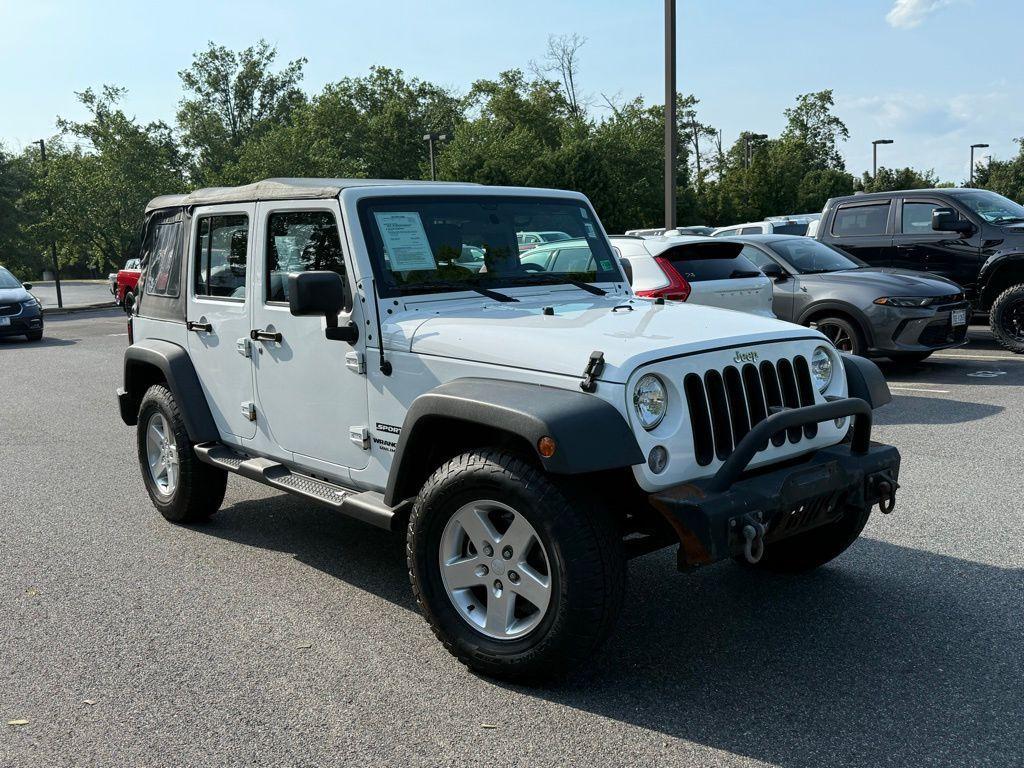 used 2015 Jeep Wrangler Unlimited car, priced at $18,599