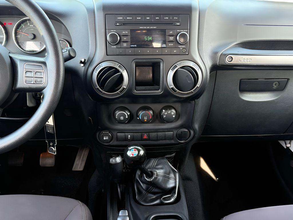 used 2015 Jeep Wrangler Unlimited car, priced at $18,599