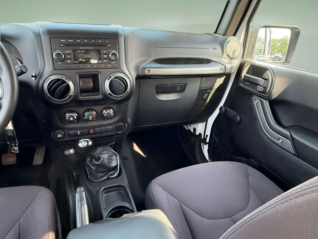 used 2015 Jeep Wrangler Unlimited car, priced at $18,599