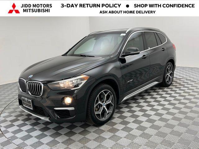 used 2018 BMW X1 car, priced at $13,895