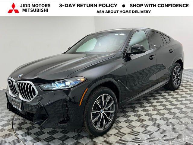 used 2025 BMW X6 car, priced at $64,895