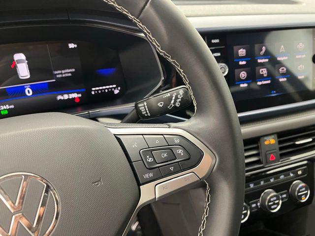 used 2024 Volkswagen Taos car, priced at $19,695