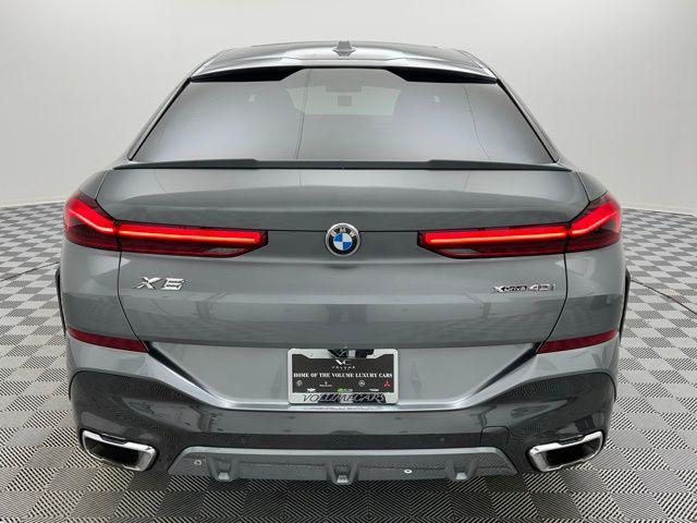 used 2024 BMW X6 car, priced at $57,895