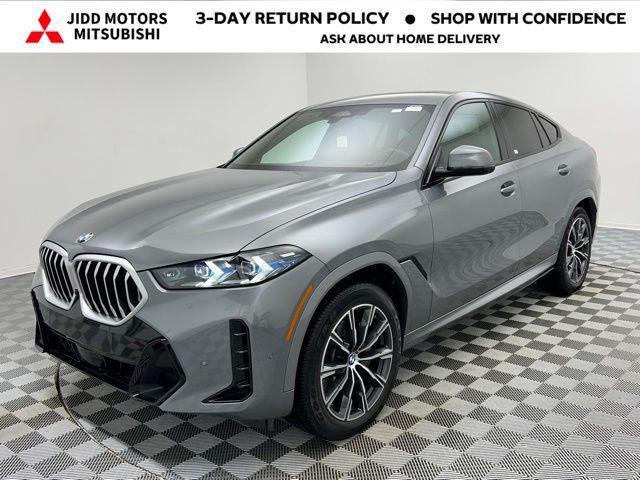 used 2024 BMW X6 car, priced at $57,895