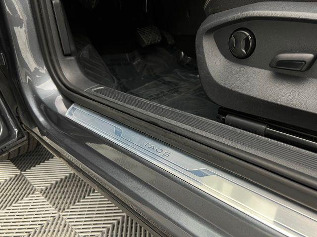 used 2024 Volkswagen Taos car, priced at $18,395