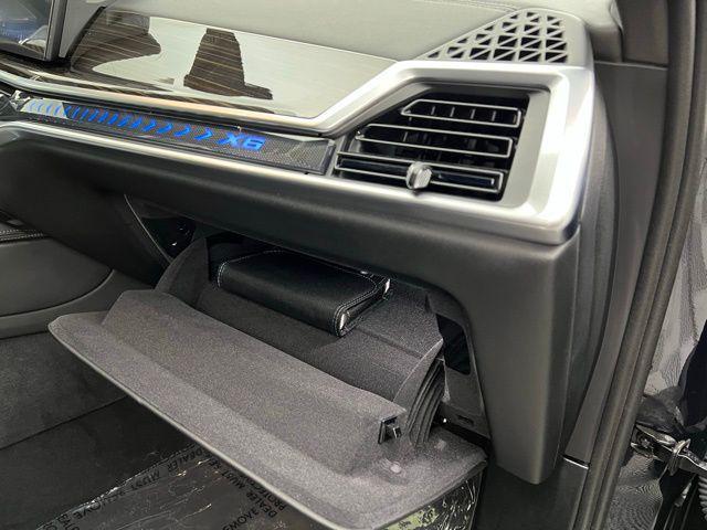 used 2025 BMW X6 car, priced at $56,895