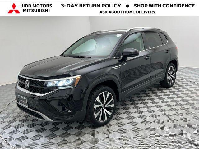 used 2024 Volkswagen Taos car, priced at $19,295