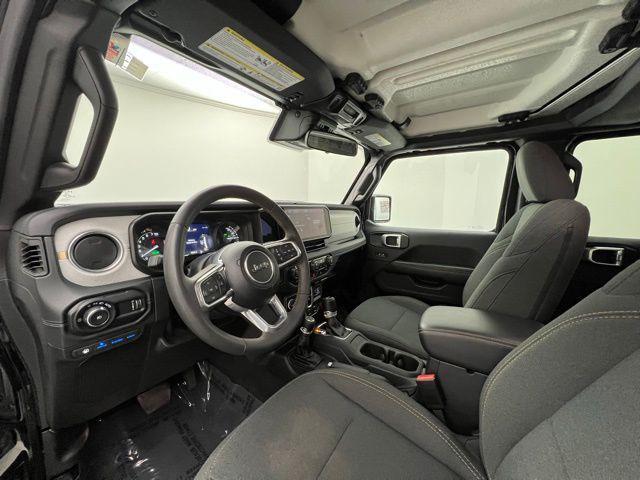 used 2024 Jeep Wrangler 4xe car, priced at $30,895