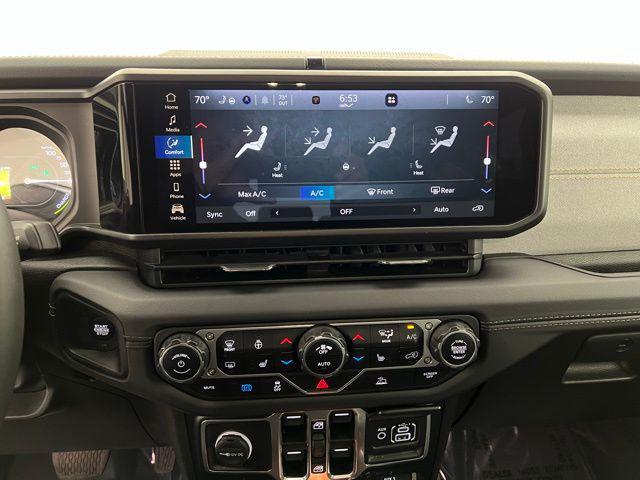 used 2024 Jeep Wrangler 4xe car, priced at $30,895