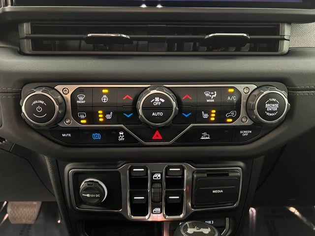 used 2024 Jeep Wrangler 4xe car, priced at $33,595