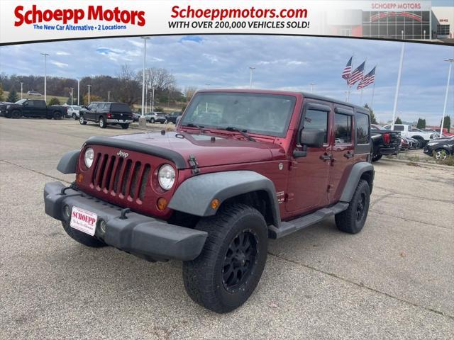 used 2011 Jeep Wrangler Unlimited car, priced at $16,995