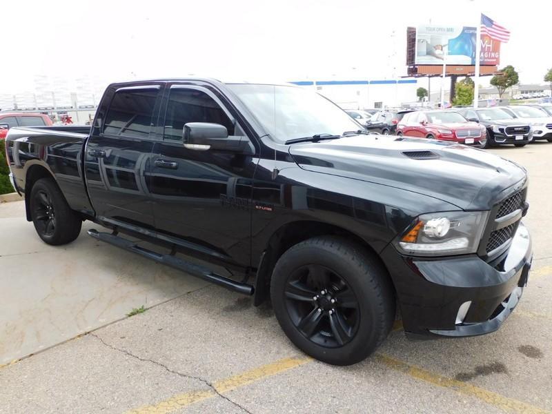 used 2018 Ram 1500 car, priced at $28,502