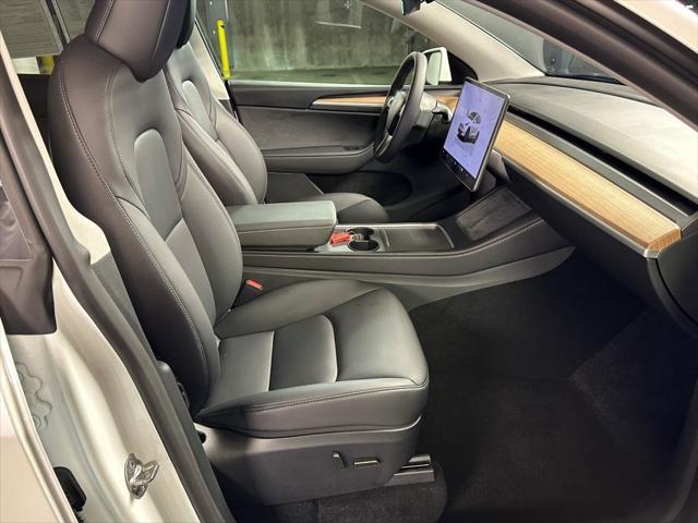 used 2025 Tesla Model Y car, priced at $38,897